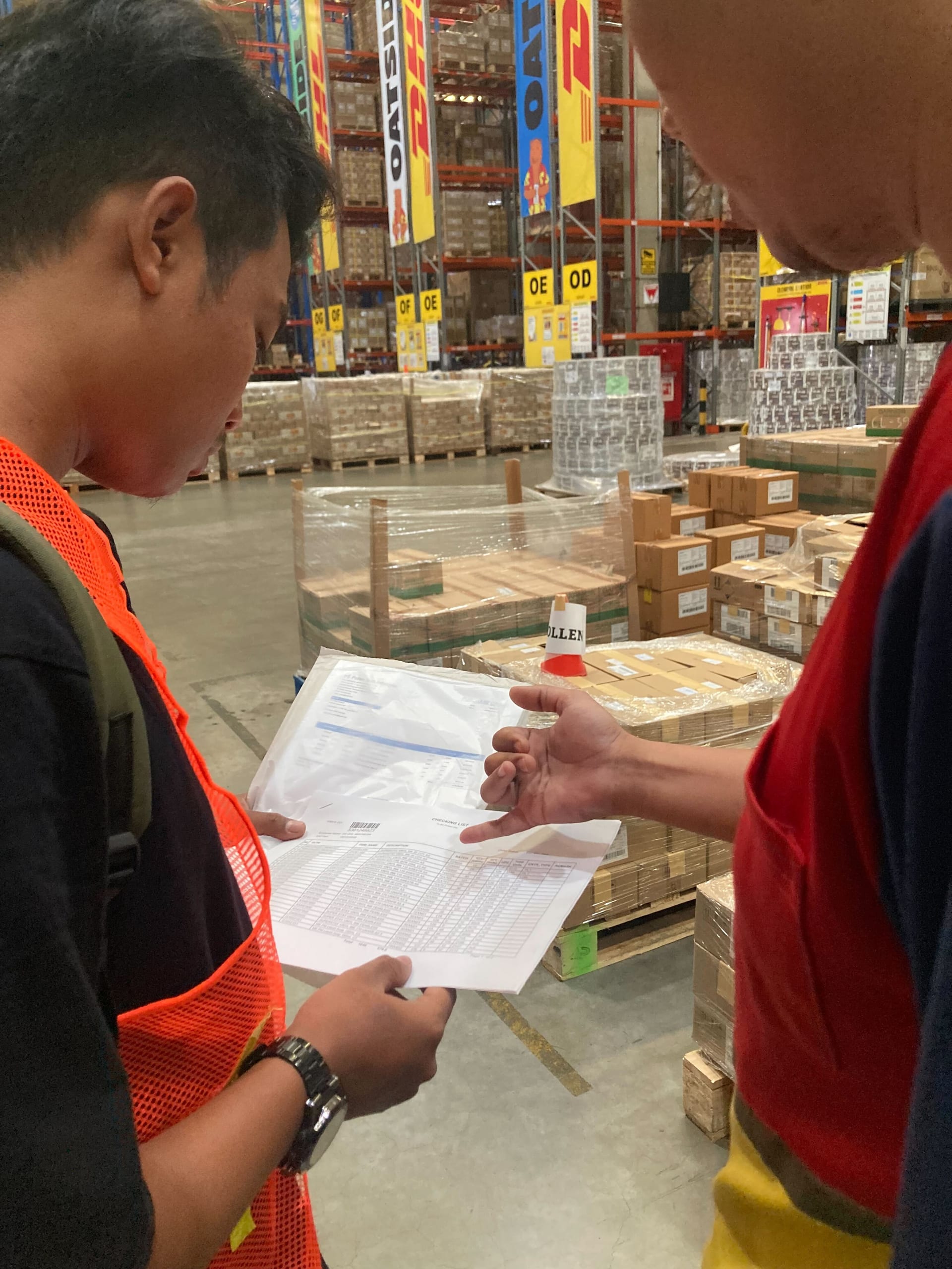 Pollen team reviewing paperwork during an inventory check